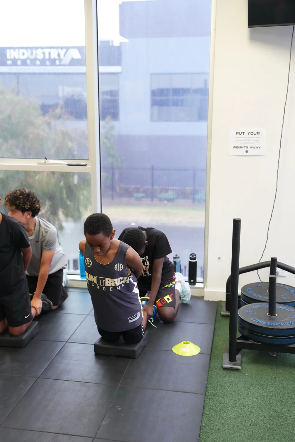 Young athletes working through a supervised training session at RIB